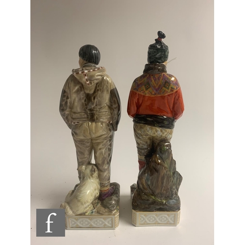 200 - A pair of Royal Copenhagen Greenlandic figures, to include Man with Sledge dog and Greenlandic Women... 