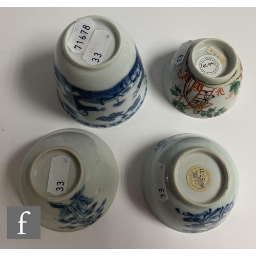 33 - Two 18th Century Nanking Cargo shipwreck porcelain tea bowls and saucers, each with stylised floral ... 