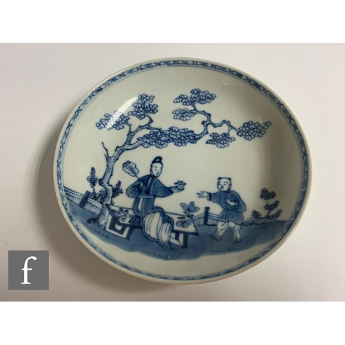 33 - Two 18th Century Nanking Cargo shipwreck porcelain tea bowls and saucers, each with stylised floral ... 