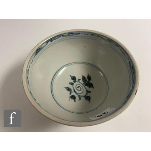 36 - A 15th Century Hoi An hoard Vietnamese Shipwreck large shallow bowl, decorated with a leaf scroll pa... 