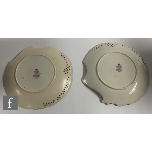 201 - Two Royal Worcester blush ivory Empress dessert plates, circa 1891, of asymmetric form with reticula... 