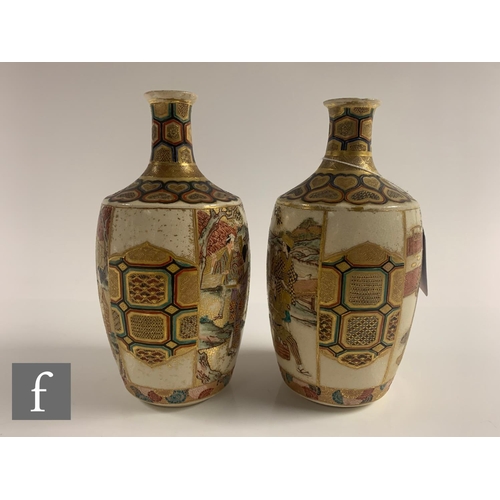 27 - A pair of Japanese satsuma vases, each of bottle form, the body of each with opposing mirror images,... 