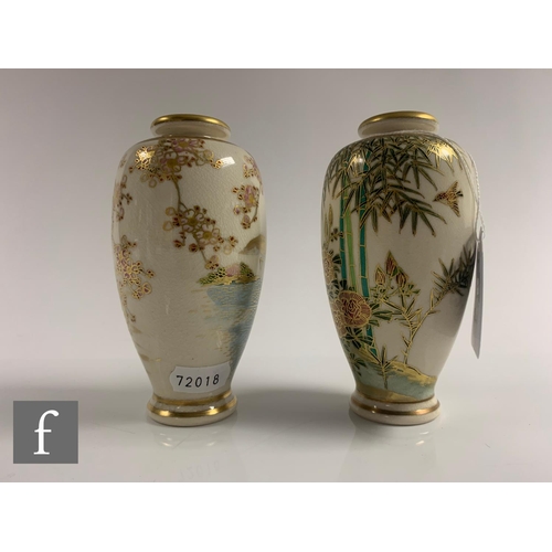 53 - Two Japanese late Meiji period satsuma vases, each of slender form, the ivory ground decorated with ... 