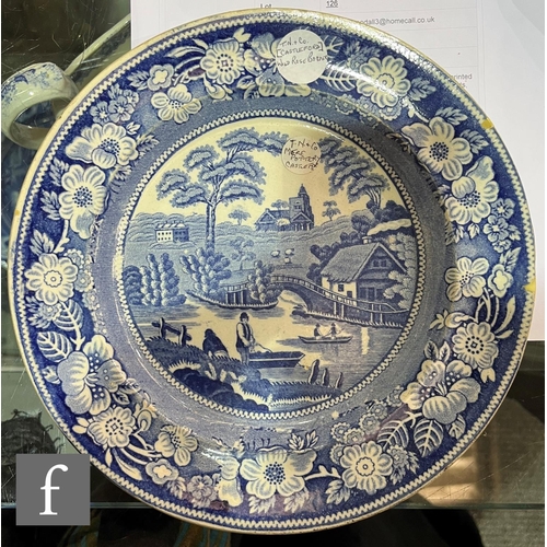 126 - A collection of blue and white transfer printed wares, to include two sauce jugs on stands, plates a... 