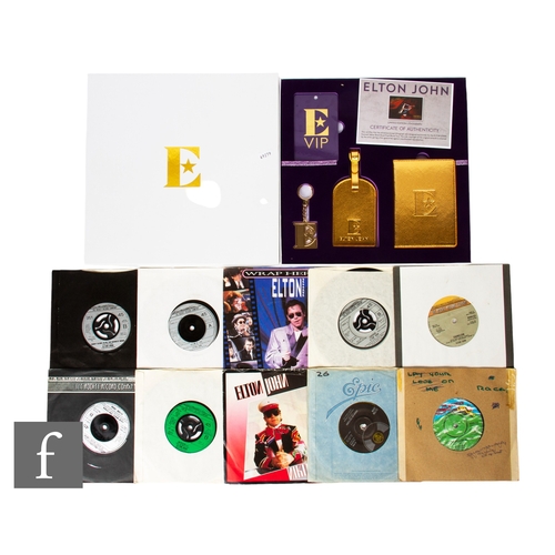 1 - An Elton John Farewell Yellow Brick Road VIP tour merchandise package, to include a tote bag and a b... 