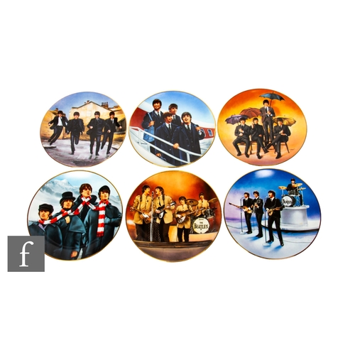 3 - A collection of six 'The Beatles' plates by Delphi, each with transfer printed designs including Bea... 