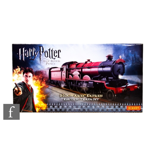 238 - An OO gauge Hornby R1128 Harry Potter and the Half-Blood Prince Hogwarts Express train set, comprisi... 