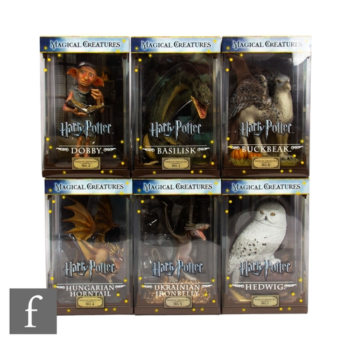 239 - A collection of six Noble Collection Harry Potter Magical Creature figures, No. 1 Hedwig, No. 2 Dobb... 