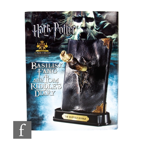 241 - A Noble Collection Harry Potter Basilisk Fang and Tom Riddle's Diary sculpture with display stand, b... 