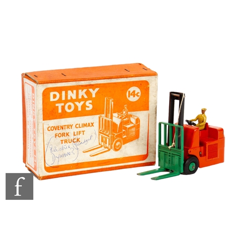 422 - A Dinky 14C Coventry Climax Fork Lift Truck, in orange with green forks and ridged hubs, in orange b... 