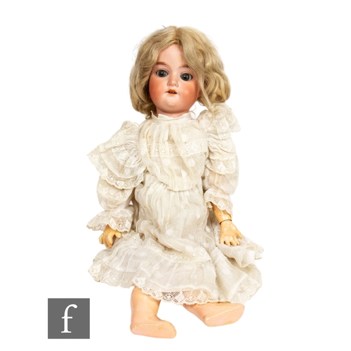 269 - An Armand Marseille bisque socket head doll, with sleeping blue eyes, painted lashes, open mouth wit... 