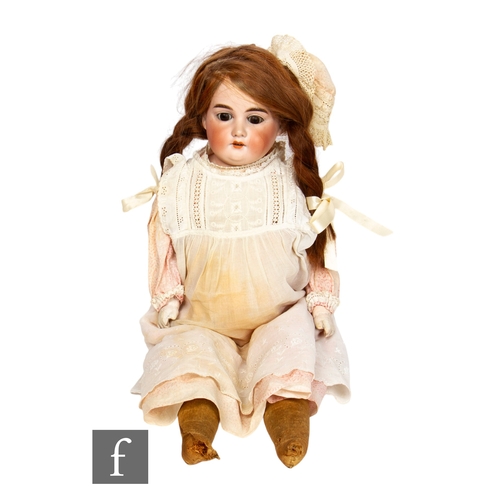 271 - An Armand Marseille bisque shoulder head doll, with sleeping brown eyes, painted lashes, open mouth ... 