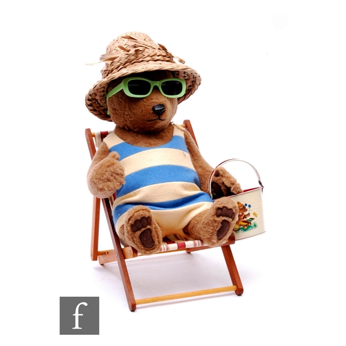 274 - An R. John Wright Paddington at the Beach teddy bear, complete with straw hat, swimsuit, sunglasses,... 