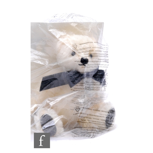 294 - A Steiff 690938 Black Diamond Bear, white mohair, wearing a black bow with Swarovski pendant, limite... 