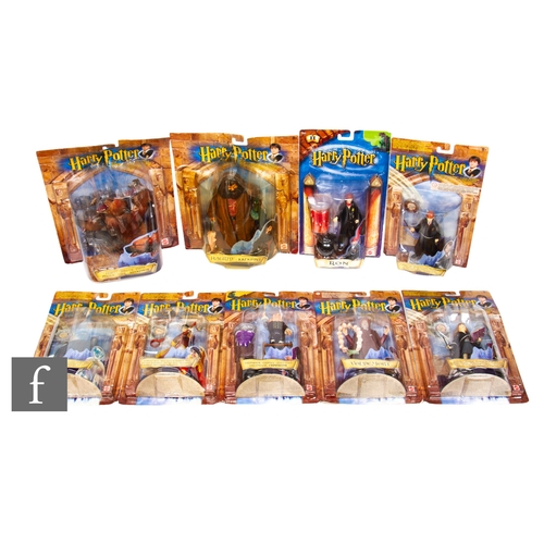 256 - A collection of Mattel Harry Potter action figures, comprising Fluffy, Hagrid, Quidditch Harry, Slim... 