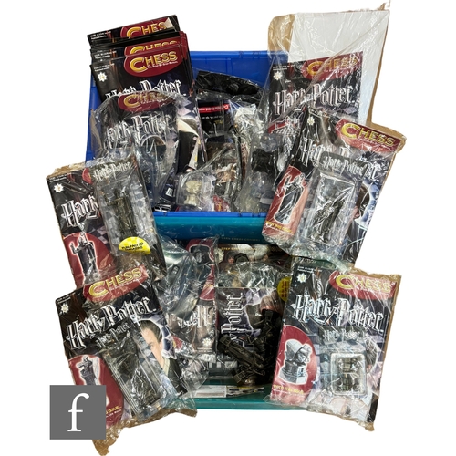 257 - A DeAgostini Harry Potter Chess set, a collection of partwork magazines and related pieces. PLEASE V... 