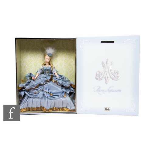 314 - A Mattel Barbie Women of Royalty Series Marie Antoinette doll, holding a pair of porcelain roses and... 