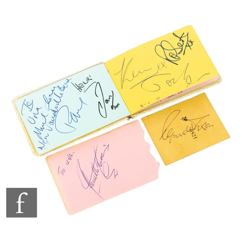 13 - An autograph album circa 1960-1970, containing signatures to include Carlos Santana, David Whitfield... 