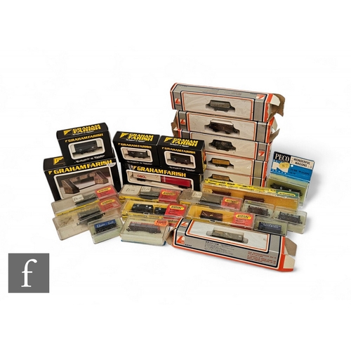 359 - A collection of N gauge rolling stock by Lima, Graham Farish, Hornby Minitrix and Peco, together wit... 