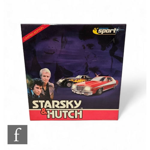 381 - A Scalextric C2603A Starsky & Hutch set, comprising Ford Torino and Chevrolet Corvette, boxed.PL... 