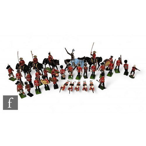 322 - A collection of toy soldiers by Britains and others, some mounted.PLEASE VIEW CONDITION REPORT... 