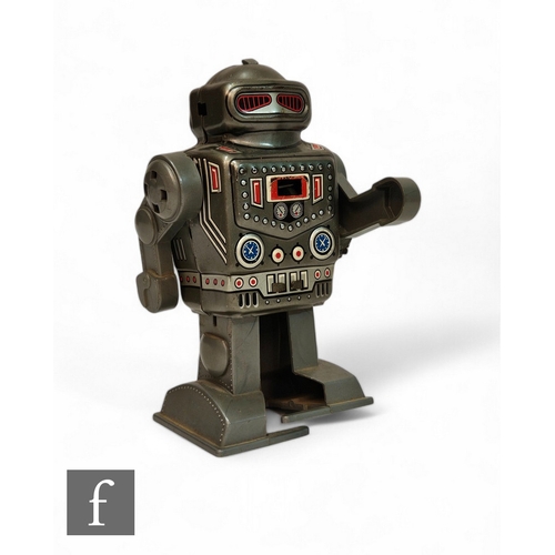 379 - A Yonezawa Captain robot, clockwork tinplate toy with plastic arms and feet, sparking feature to che... 