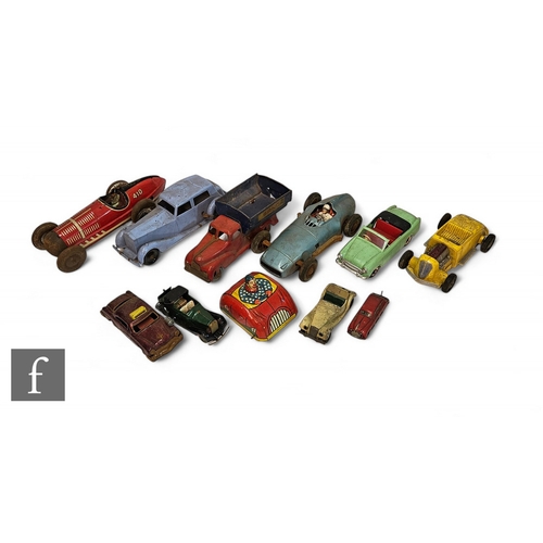 380 - A collection of tinplate and plastic vehicles, to include a JNF friction drive Mercedes-Benz, a Marx... 