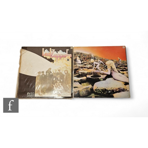 122 - Led Zeppelin - Two LPs to include II, Red Maroon Label 'Killing Floor' 588 198, and Houses of the Ho... 