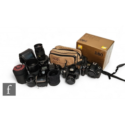 207 - A collection of SLR cameras and accessories, to include Canon EOS 1000F, Samsung AF Zoom 1050, Canon... 