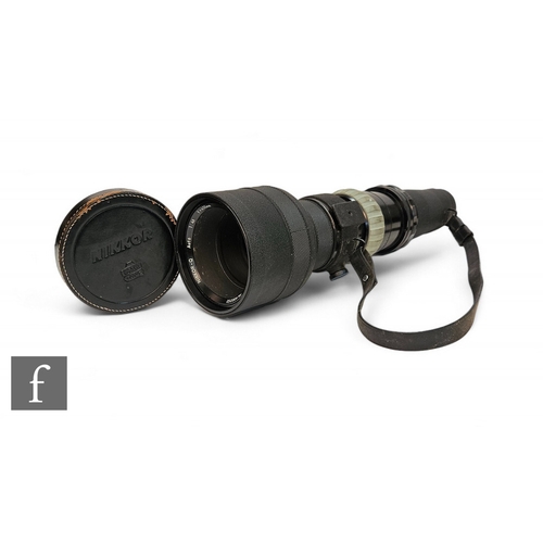 213 - A Nikkor Q f400mm 4.5 lens, telephoto lens, No. 400252, with adaptor.PLEASE VIEW CONDITION REPORT... 