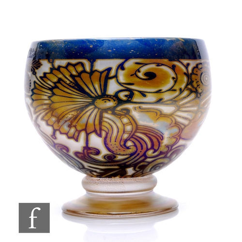 335 - A contemporary Jonathon Harris studio trial graal glass footed chalice, in the Aztec pattern, decora... 