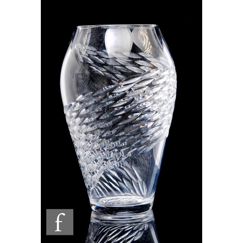 372 - A large later 20th Century Czech clear crystal glass vase of swollen sleeve form, decorated with a s... 