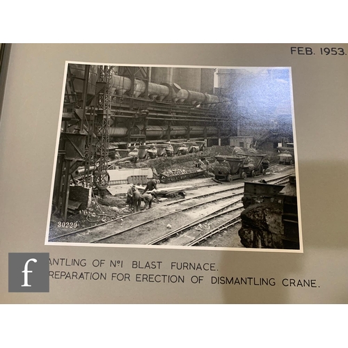 524 - A 1950s photograph album of full plate images depicting demolition sites (Jan 1953), blast furnaces ... 