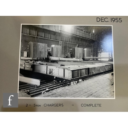 524 - A 1950s photograph album of full plate images depicting demolition sites (Jan 1953), blast furnaces ... 