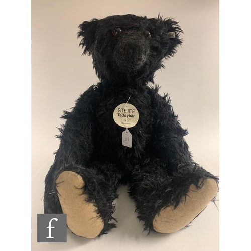 285 - Two Steiff replica teddy bears, 407284 1912, black mohair, height 70cm, and 407291 1921, white mohai... 