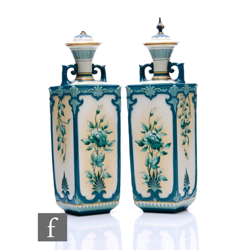 10 - A pair of early 20th Century Hadley's faience covered vases of square section, with a short waisted ... 