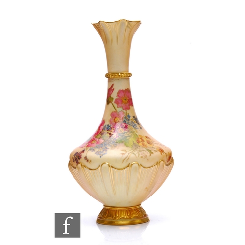 20 - A Royal Worcester blush ivory vase, circa 1920, of baluster form with flared neck and half moulded r... 