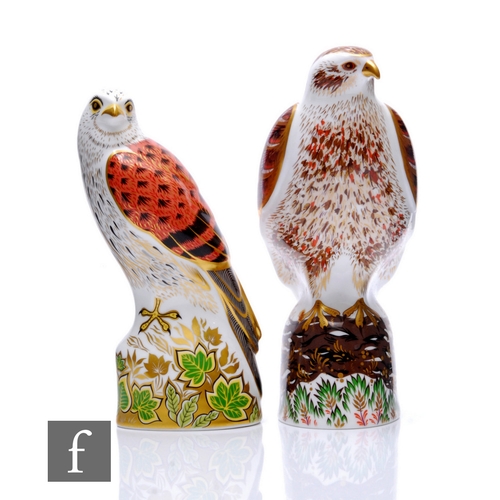 43 - Two Royal Crown Derby Birds of Prey paperweights, including a limited edition buzzard, No.101/750, h... 