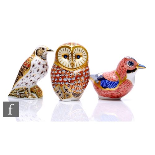 45 - Three Royal Crown Derby paperweights, to include a jay, height 9cm, a song thrush, height 10cm, and ... 