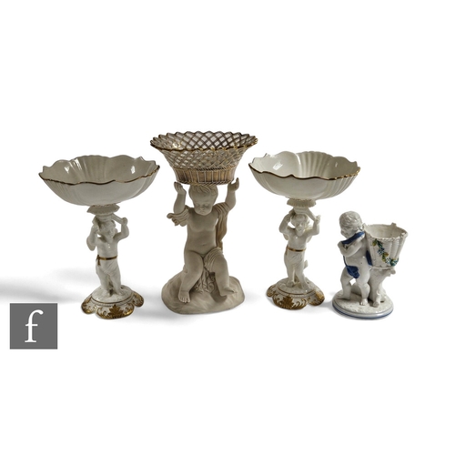 74 - A Copeland & Garrett parian centrepiece, modelled as a cherub supporting a reticulated porcelain... 