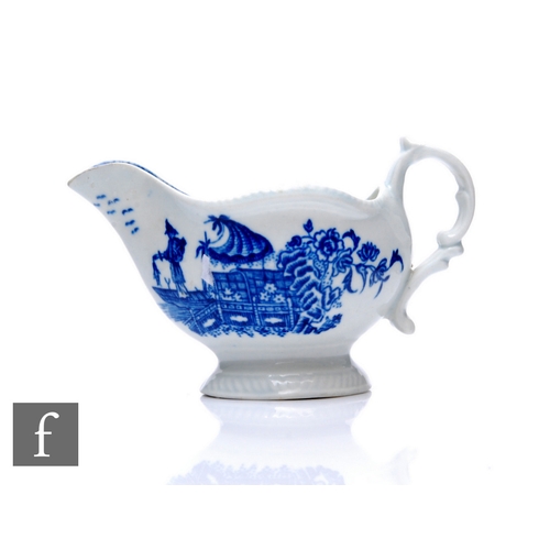 88 - A Worcester blue and white fisherman pattern sauce boat, circa 1780, printed decoration over white g... 