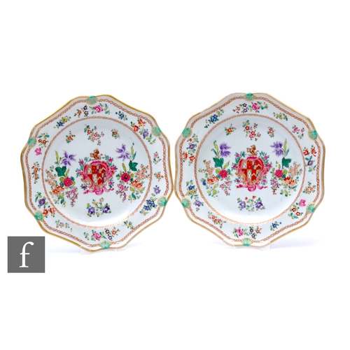 91 - A pair of Sansom of Paris Chinese export style armorial plates, painted with central armorial cartou... 