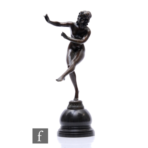 494 - A late 20th Century bronze figure of a naked female dancer with leg raised, on circular stepped base... 