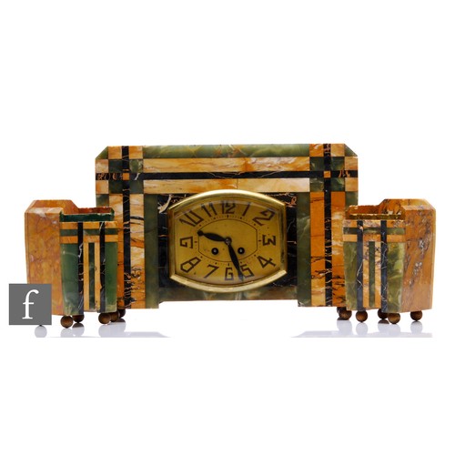 621 - An Art Deco clock garniture in green and veined brown marble segmented design, shaped oval dial, sta... 