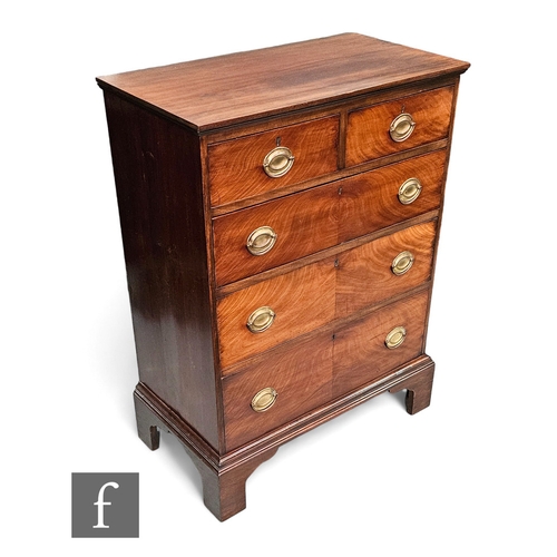 638 - A 19th Century and later constructed mahogany chest of two short and three long drawers, oval brass ... 