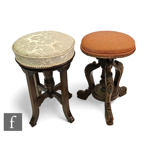 651 - AMENDED DESCRIPTION A Victorian mahogany revolving piano stool on splayed legs, upholstered in cream... 