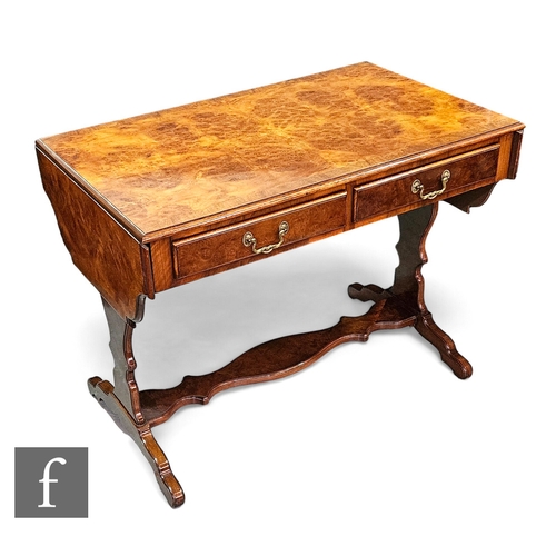 686 - A George II style crossbanded walnut drop flap sofa table, fitted with two frieze drawers on shaped ... 