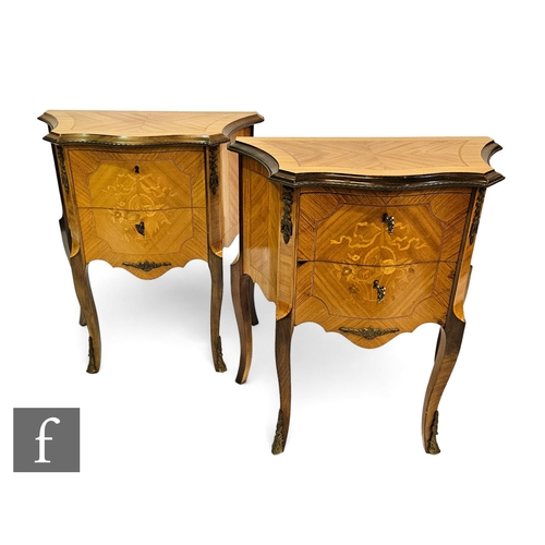 693 - A pair of mid 20th Century or later French marquetry inlaid bedside cabinets, the moulded edge serpe... 