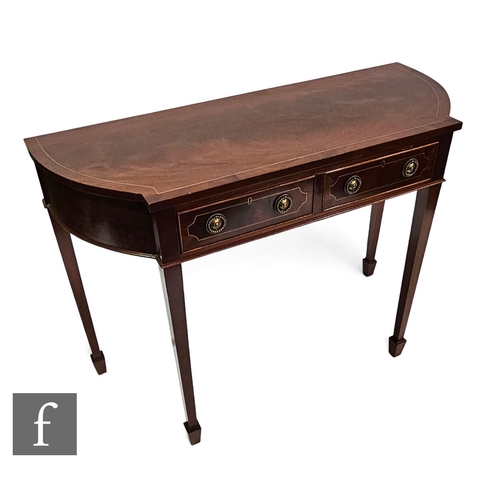 680 - A George III style inlaid mahogany two drawer serving table fitted with two drawers, brass handles, ... 