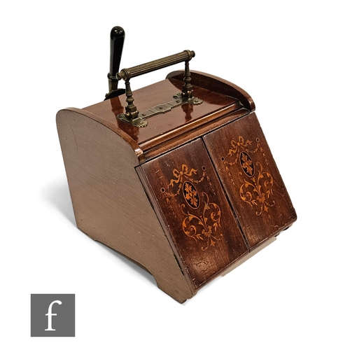 712 - An Edwardian mahogany coal scuttle with unusual double door opening action causing the handle to fal... 